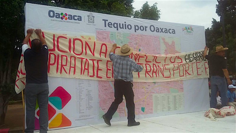 Mientras funcionarios pintan paredes, transportistas protestan