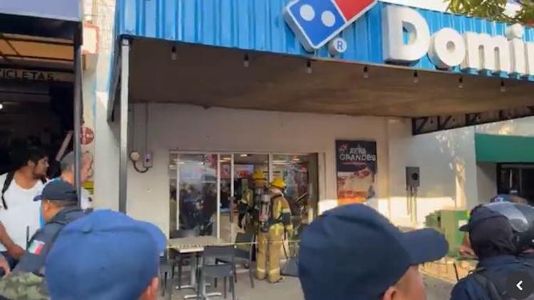 Arrojan artefacto explosivo en Dominos Pizza de Juchitán